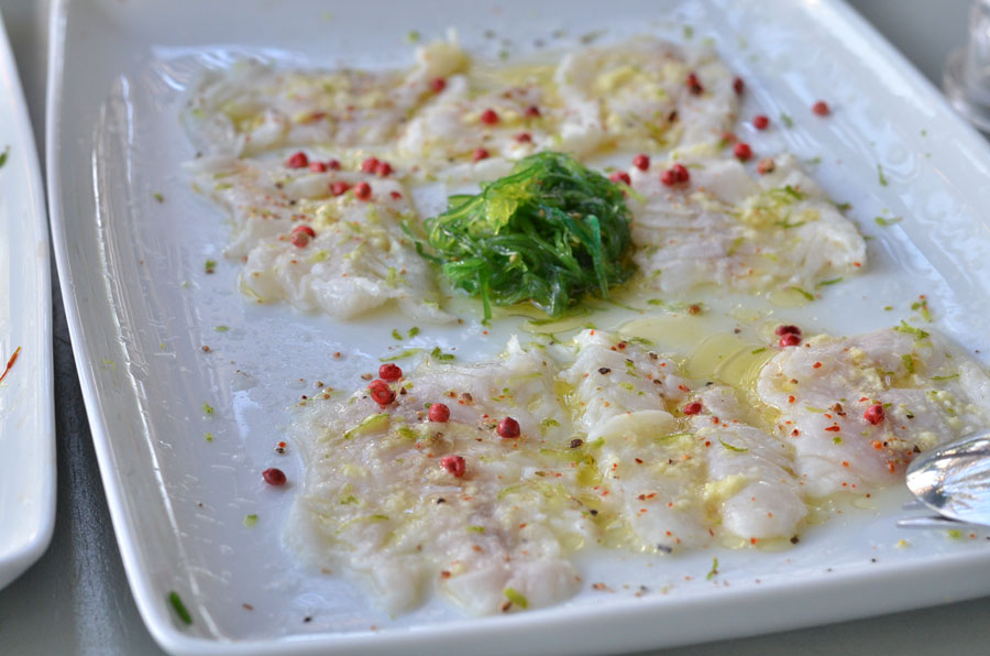 lovely Restaurant sea bass carpaccio in Mykonos, Greece - Stasha Travel and fashion Blog